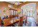 Formal dining room with hardwood floors and large windows at 16364 W Roosevelt St, Goodyear, AZ 85338