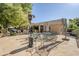 Patio with seating area and outdoor heater at 16364 W Roosevelt St, Goodyear, AZ 85338