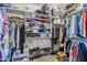 Large walk-in closet with ample shelving and hanging space at 16364 W Roosevelt St, Goodyear, AZ 85338