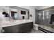 Modern bathroom with double vanity and large shower at 16510 N 92Nd St # 1006, Scottsdale, AZ 85260