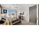 Bright bedroom with a comfortable bed and city views at 16510 N 92Nd St # 1006, Scottsdale, AZ 85260
