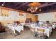 Spacious dining room featuring modern decor, stylish lighting, and neatly arranged tables at 16510 N 92Nd St # 1006, Scottsdale, AZ 85260