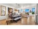 Elegant dining room with dark wood table and bench at 16510 N 92Nd St # 1006, Scottsdale, AZ 85260