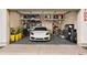 Spacious garage with overhead storage and room for a car at 16510 N 92Nd St # 1006, Scottsdale, AZ 85260