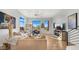 Bright living room, featuring a fireplace and large windows at 16510 N 92Nd St # 1006, Scottsdale, AZ 85260