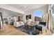 Spacious living room with large windows and comfy seating at 16510 N 92Nd St # 1006, Scottsdale, AZ 85260
