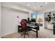 Modern home office with standing desk and dual monitors at 16510 N 92Nd St # 1006, Scottsdale, AZ 85260