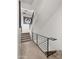 Modern staircase with metal railing and neutral carpet at 16510 N 92Nd St # 1006, Scottsdale, AZ 85260