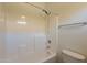 Clean bathroom with shower/tub combo and toilet at 17365 N Cave Creek Rd # 107, Phoenix, AZ 85032