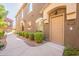 Townhome with a private entrance and neatly landscaped walkway at 17365 N Cave Creek Rd # 107, Phoenix, AZ 85032