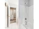Bathroom with shower/tub combo and access to hallway at 19339 N Madison Rd, Maricopa, AZ 85139