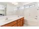 Clean bathroom with double vanity and bathtub at 19339 N Madison Rd, Maricopa, AZ 85139