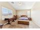 Simple bedroom with wood furniture and carpeted floor at 19339 N Madison Rd, Maricopa, AZ 85139
