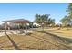 A park with a picnic table area for residents to enjoy outdoor gatherings and community events at 19339 N Madison Rd, Maricopa, AZ 85139