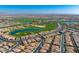 Primary-planned community featuring a golf course and lake in a desert setting at 210 E Bergamot Ln, Queen Creek, AZ 85140