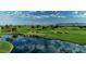 Picturesque golf course with a pond, sand traps, and lush green fairway at 210 E Bergamot Ln, Queen Creek, AZ 85140