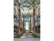 Palm tree-lined walkway in High Street at 21320 N 56Th St # 2144, Phoenix, AZ 85054