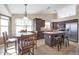 Kitchen with island, stainless steel appliances, and dark wood cabinets at 21409 N 33Rd Dr, Phoenix, AZ 85027