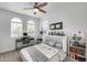 Bedroom with a bed, desk, and built-in shelving at 2156 W Sierra Sunset Trl, Phoenix, AZ 85085