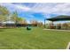 Dog park with shaded seating and agility equipment at 2156 W Sierra Sunset Trl, Phoenix, AZ 85085