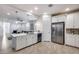 Open concept kitchen with island and stainless steel appliances at 2156 W Sierra Sunset Trl, Phoenix, AZ 85085