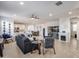Open concept living room with kitchen and fireplace views at 2156 W Sierra Sunset Trl, Phoenix, AZ 85085