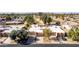 Aerial view of homes near a golf course at 25244 S Saddletree Dr, Sun Lakes, AZ 85248