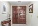 Interior view of double doors and entryway at 25244 S Saddletree Dr, Sun Lakes, AZ 85248