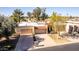 Exterior view of a charming home with tile roof at 25244 S Saddletree Dr, Sun Lakes, AZ 85248