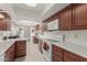 Bright kitchen features ample cabinetry, updated appliances, and tile flooring at 25244 S Saddletree Dr, Sun Lakes, AZ 85248