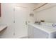 Convenient laundry room with washer and dryer hookups at 25244 S Saddletree Dr, Sun Lakes, AZ 85248