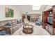 Spacious living room with vaulted ceiling and skylight at 25244 S Saddletree Dr, Sun Lakes, AZ 85248