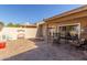 Outdoor patio with seating and fire pit at 25244 S Saddletree Dr, Sun Lakes, AZ 85248