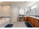 Double vanity bathroom with soaking tub and separate shower at 2734 E Birchwood Pl, Chandler, AZ 85249