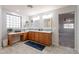Double vanity bathroom with a soaking tub and shower at 2734 E Birchwood Pl, Chandler, AZ 85249