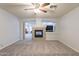 Bright bedroom with fireplace and ceiling fan at 2734 E Birchwood Pl, Chandler, AZ 85249