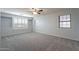 Bright bedroom with ceiling fan and window shutters at 2734 E Birchwood Pl, Chandler, AZ 85249