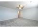 Spacious bedroom with ceiling fan and double doors at 2734 E Birchwood Pl, Chandler, AZ 85249
