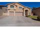 Two-story house with a large driveway and landscaping at 2734 E Birchwood Pl, Chandler, AZ 85249