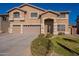 Two-story house with a large driveway and landscaping at 2734 E Birchwood Pl, Chandler, AZ 85249