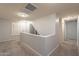 Bright hallway with carpeted floors and access to bedrooms at 2734 E Birchwood Pl, Chandler, AZ 85249