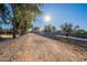 Irrigation canal path with trees and residential views at 2734 E Birchwood Pl, Chandler, AZ 85249