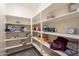 Well-organized linen closet with ample shelving for storage at 2734 E Birchwood Pl, Chandler, AZ 85249