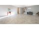 Spacious living room with tile floors and large windows at 2734 E Birchwood Pl, Chandler, AZ 85249