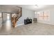 Spacious living room with tile floors and large windows at 2734 E Birchwood Pl, Chandler, AZ 85249