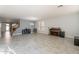 Spacious living room with tile floors and large windows at 2734 E Birchwood Pl, Chandler, AZ 85249