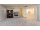 Living area with fireplace and access to upper level at 2734 E Birchwood Pl, Chandler, AZ 85249