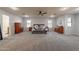 Spacious main bedroom with carpeted floors and ceiling fan at 2734 E Birchwood Pl, Chandler, AZ 85249