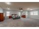 Spacious main bedroom with carpeted floors and ceiling fan at 2734 E Birchwood Pl, Chandler, AZ 85249