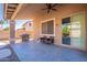 Covered patio with grill and seating at 2734 E Birchwood Pl, Chandler, AZ 85249